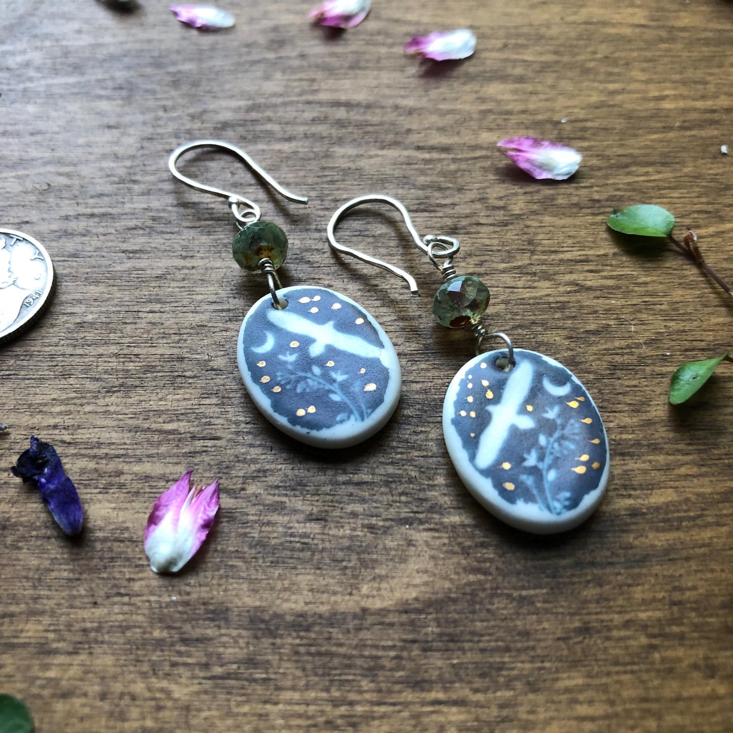 Hawk earrings With Faceted Sea Foam Glass Beads