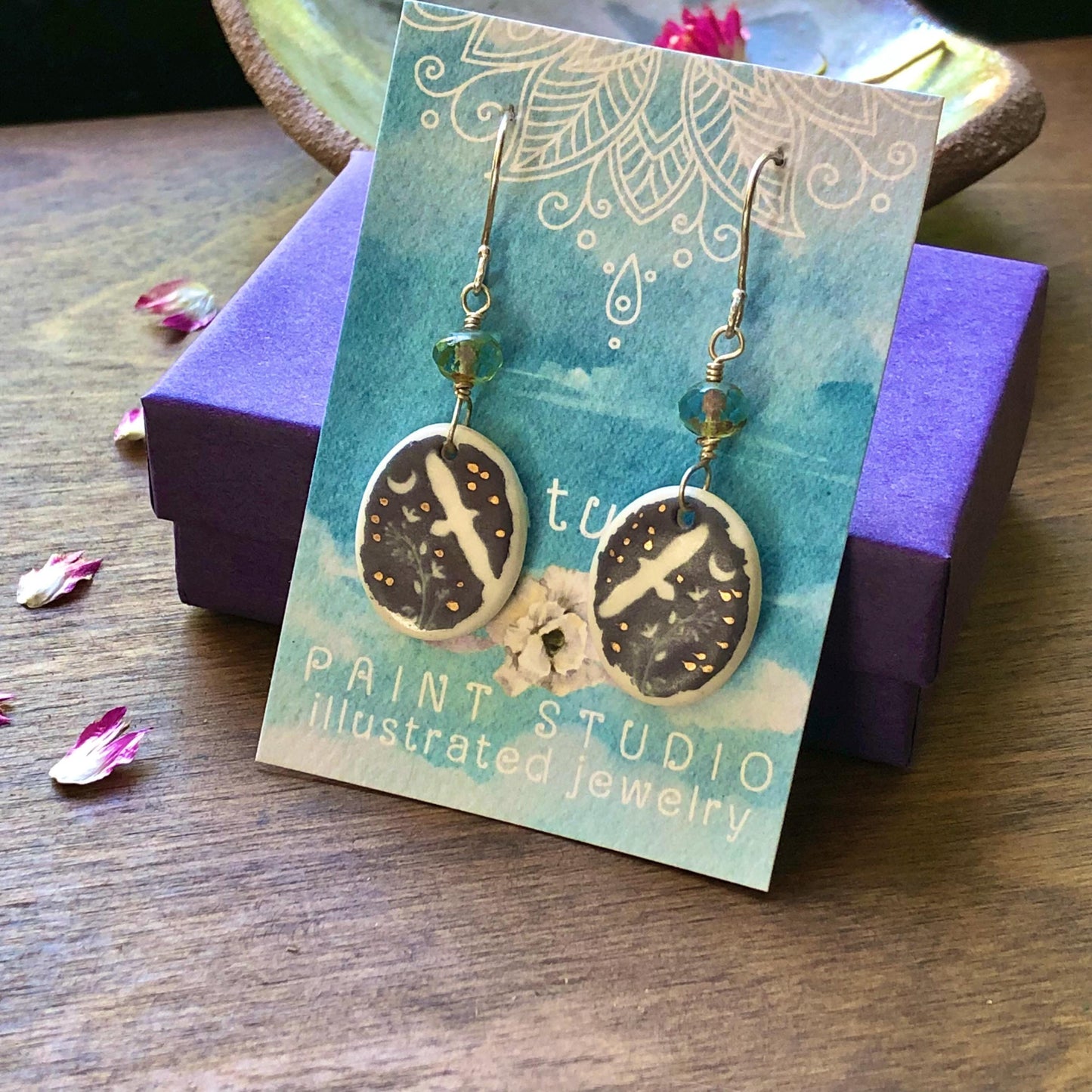 Hawk earrings With Faceted Sea Foam Glass Beads