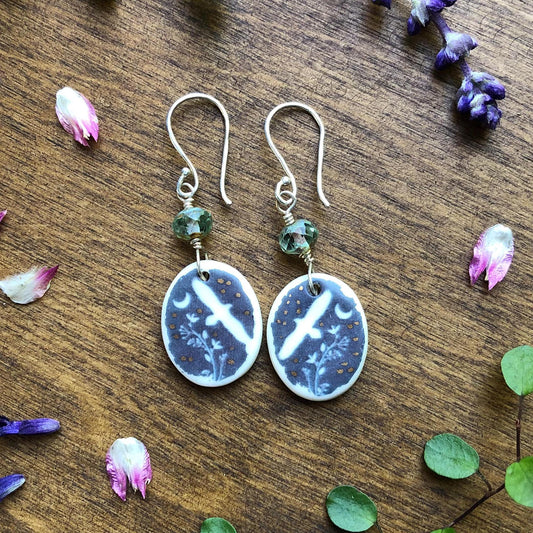 Hawk earrings With Faceted Sea Foam Glass Beads