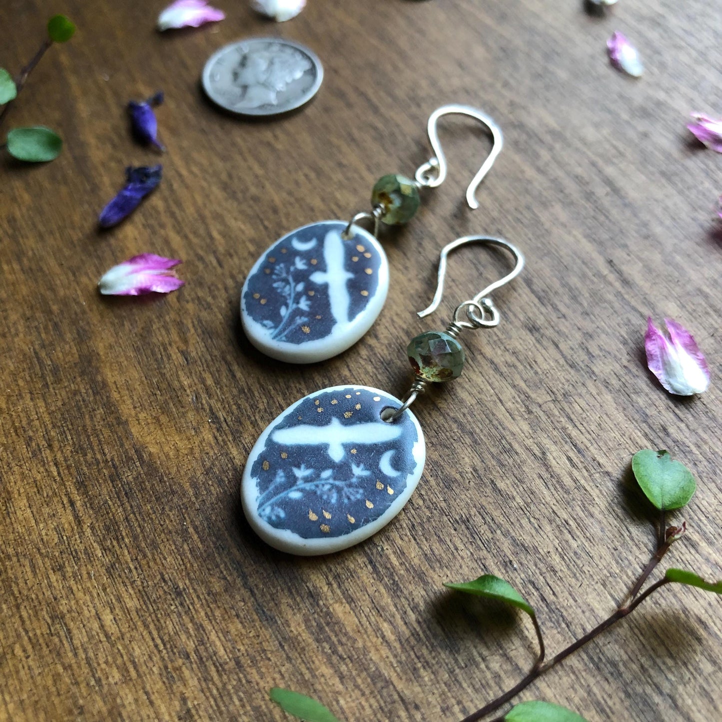 Hawk earrings With Faceted Sea Foam Glass Beads